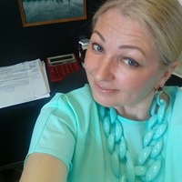 Оля Исакова